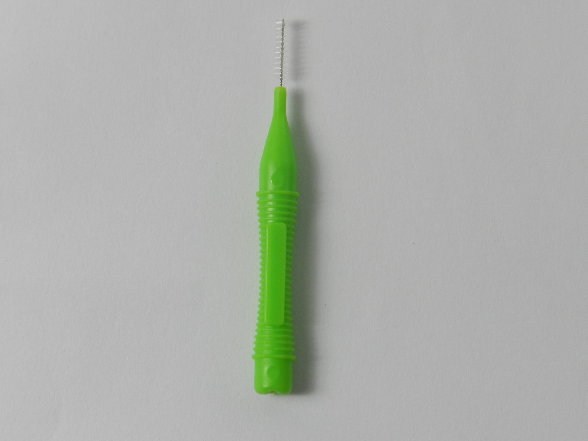 LD Ultra Interdental Brush in yellow, 0.4mm, from LD Dental Disposables, designed for effective interdental cleaning.