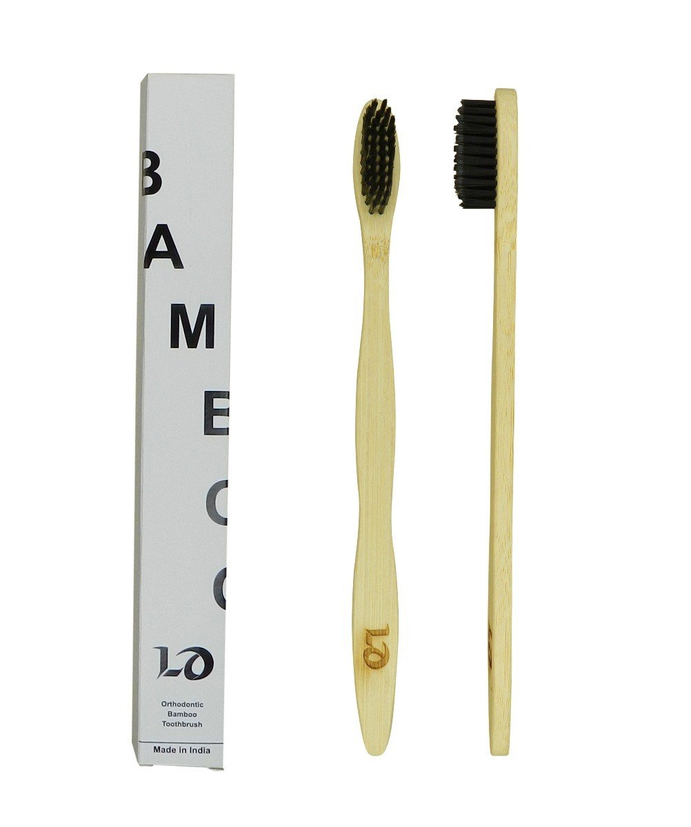 LD Orthodontic Bamboo Toothbrush, a manual toothbrush with eco-friendly bamboo handle and orthodontic bristles, for effective dental cleaning.