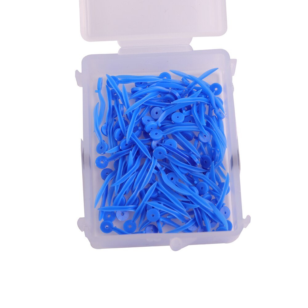 Blue LD Dental Fixing Wedges with Holes, extra-small size, designed for dental procedures, from LD Dental Disposables.