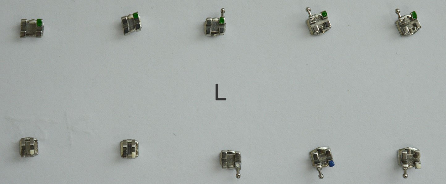 Leone Roth MBT Midi and Mini Orthodontic Metal Brackets, high-precision dental brackets for braces, shown in a kit of 20 pieces.