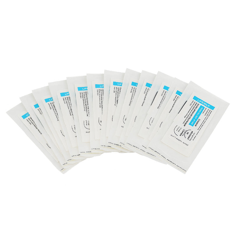 LIFELINE LifeSilk sterile needle suture 3/8 circle cutting needle for surgical suturing, shown with attached suture thread.