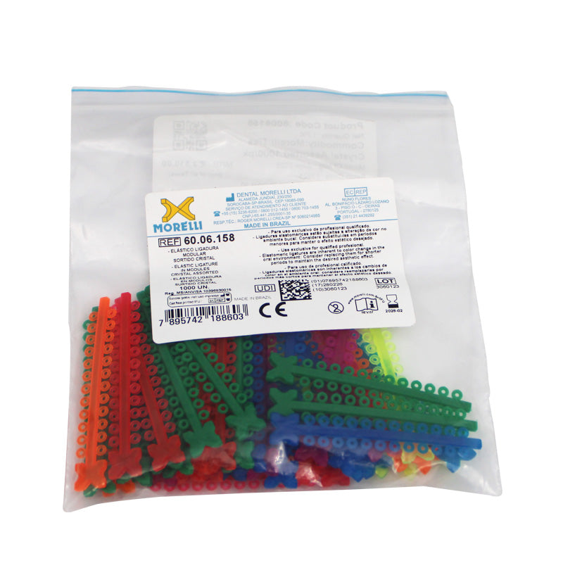 Morelli elastic ligature ties in assorted modules, clear and colorful, used for secure dental or orthodontic applications.