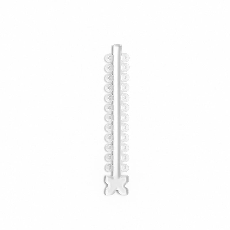 Assorted Morelli elastic ligature ties in modules, clear and colorful, used for securing dental or orthodontic appliances.