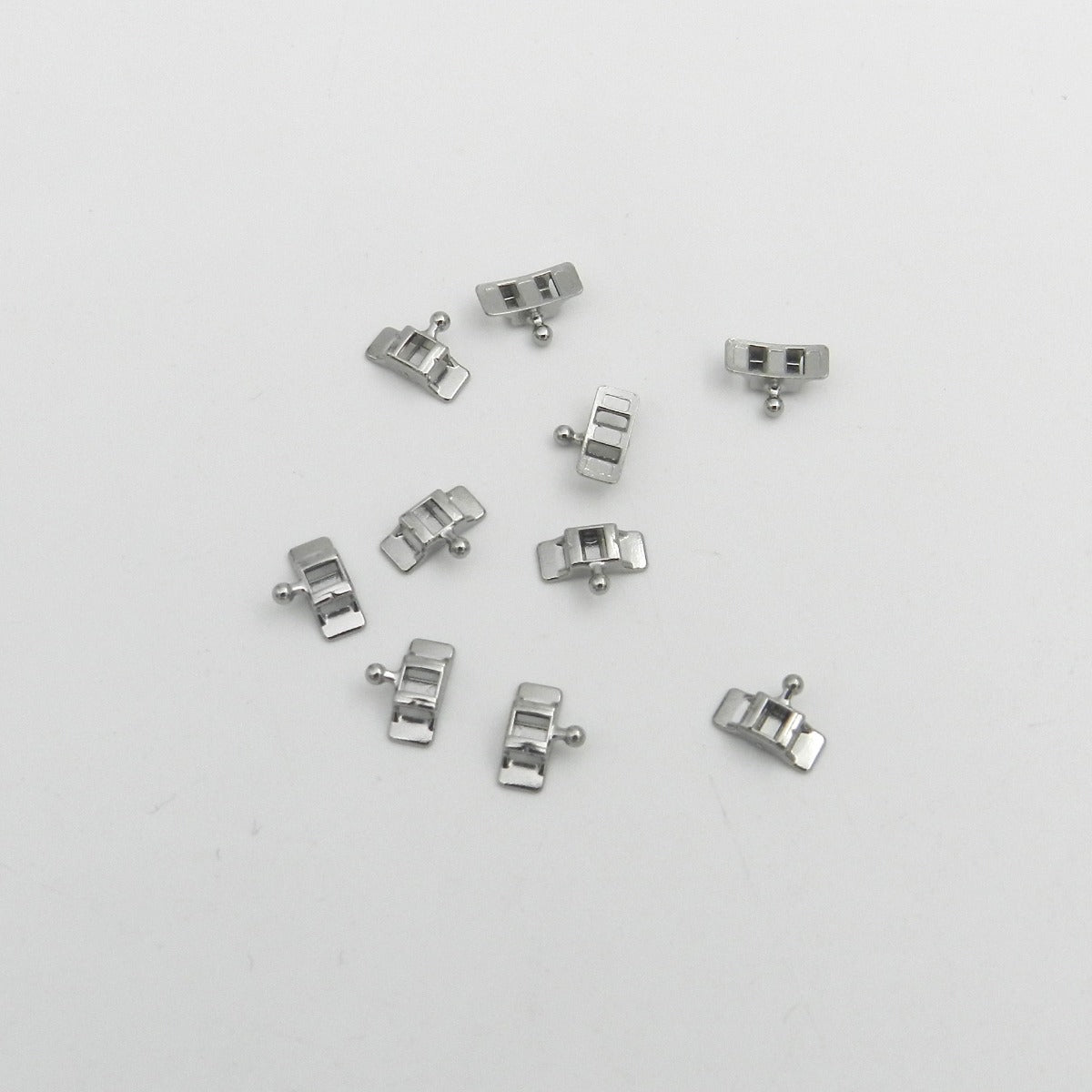 Weldable Morelli Lingual Tube with Hook, stainless steel dental orthodontic component, designed for lingual appliance application.