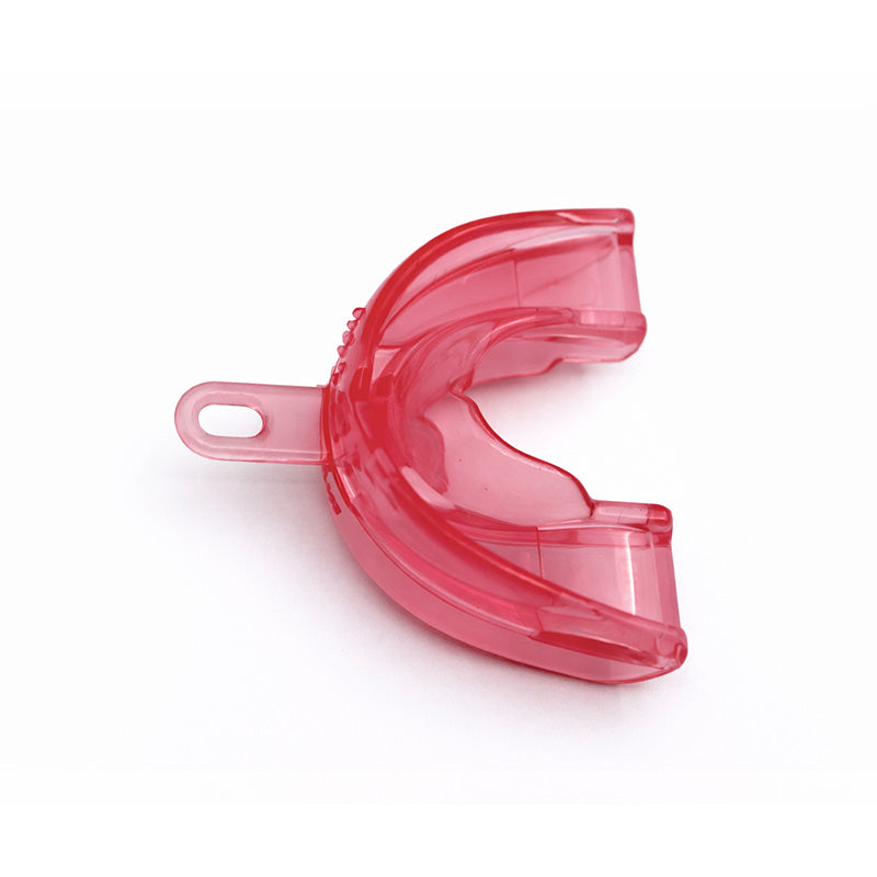 Myofunctional Research Co. MRC Trainer for Infant Phase 1 in soft pink, a small orthodontic appliance for infants.