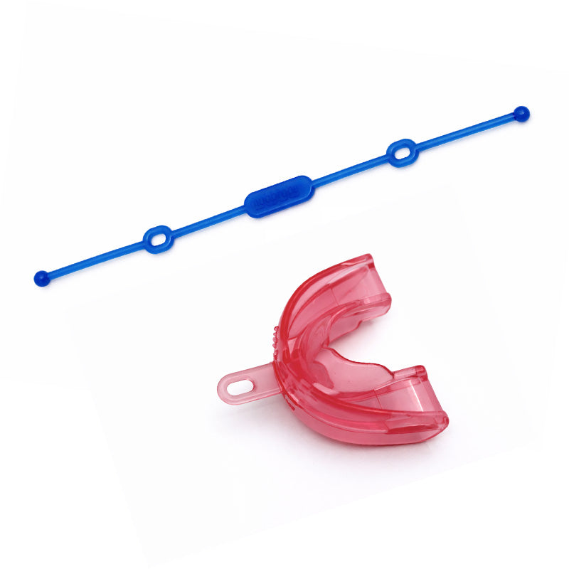Soft pink MRC Trainer for Infant Phase 1, a Myofunctional Research Co. appliance for orthodontic development and oral therapy.