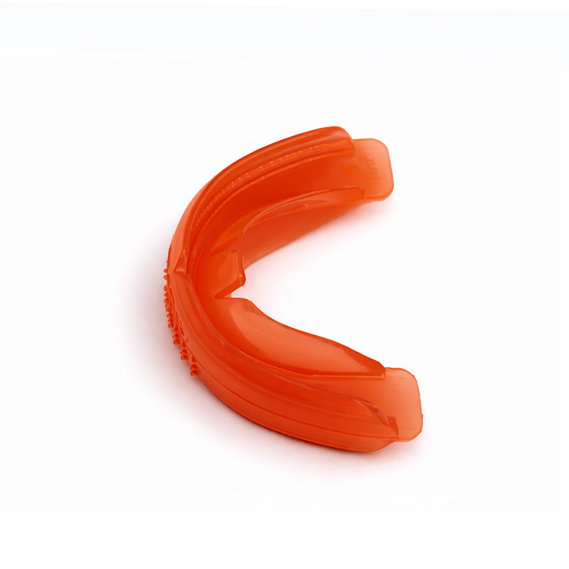Orange MRC Trainer T4B appliance for braces by Myofunctional Research Co., used as a trainer appliance and splint.