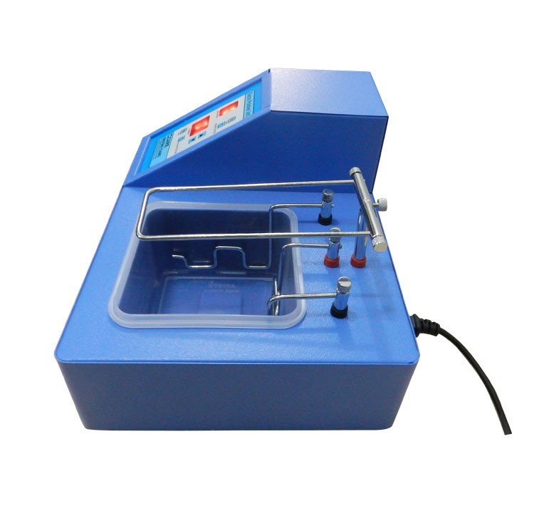 OrthoCare Electro Polishing Unit, an electro polisher with a sleek design, used for dental or orthodontic polishing tasks.