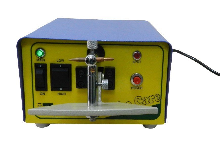 OrthoCare Mini Spot Welder showing compact design and welding tips for dental or orthodontic repairs.