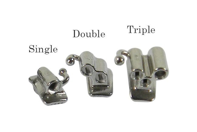 OrthoClassic bondable MBT/Roth .018 orthodontic tubes on a molar bracket for right first molar, set of five, dental appliance components.