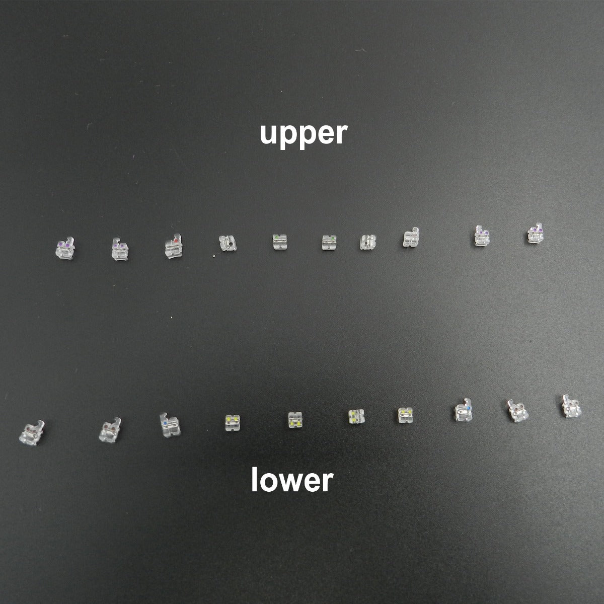 Osstem OK Real Resin Aesthetic Brackets with Metal Slot by Osstem Orthodontics, shown in a pack of 20 for orthodontic treatment