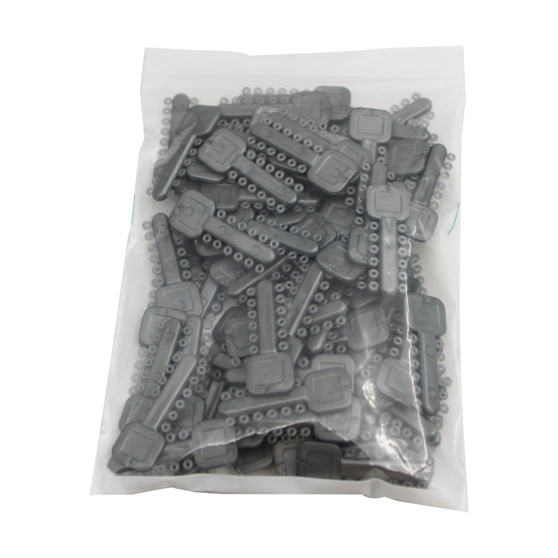 Clear Rabbit Force Mini Stix Ligature Ties for dental braces, shown in a close-up image with small, flexible ties.