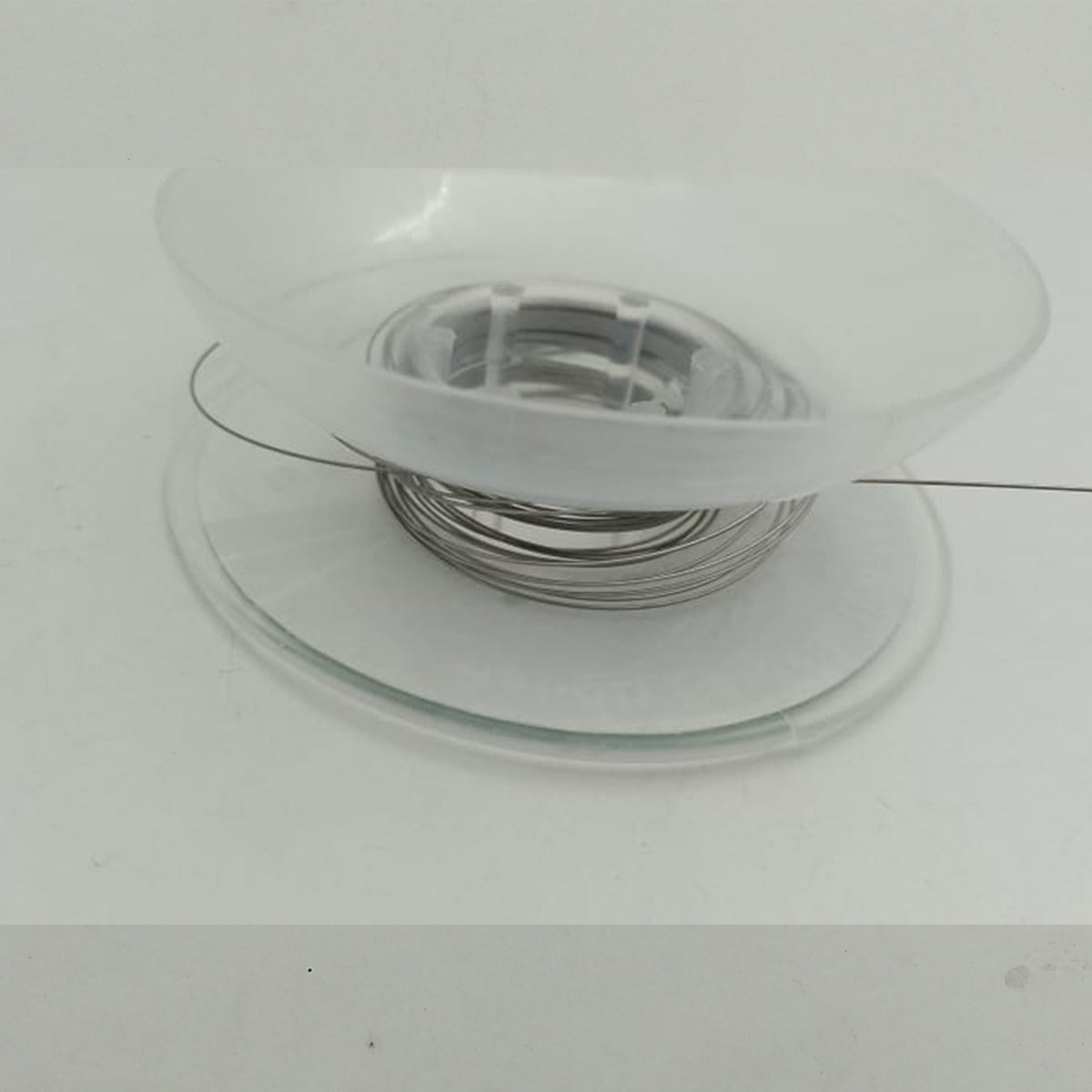 Rabbit Force RF Niti Wire in Spool, 15 ft, nickel titanium wire for dental and orthodontic use, coiled on a spool.