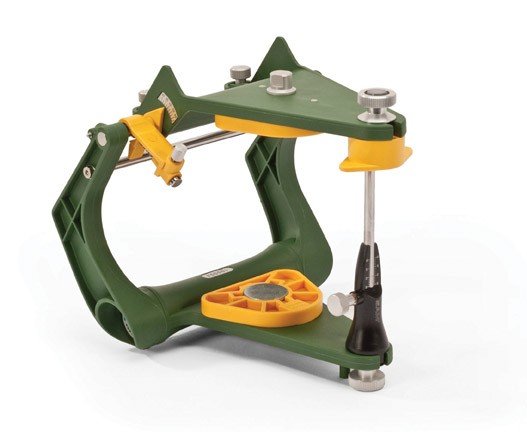 SAM SE articulator with two magnetic plates for precise dental model mounting and articulation.