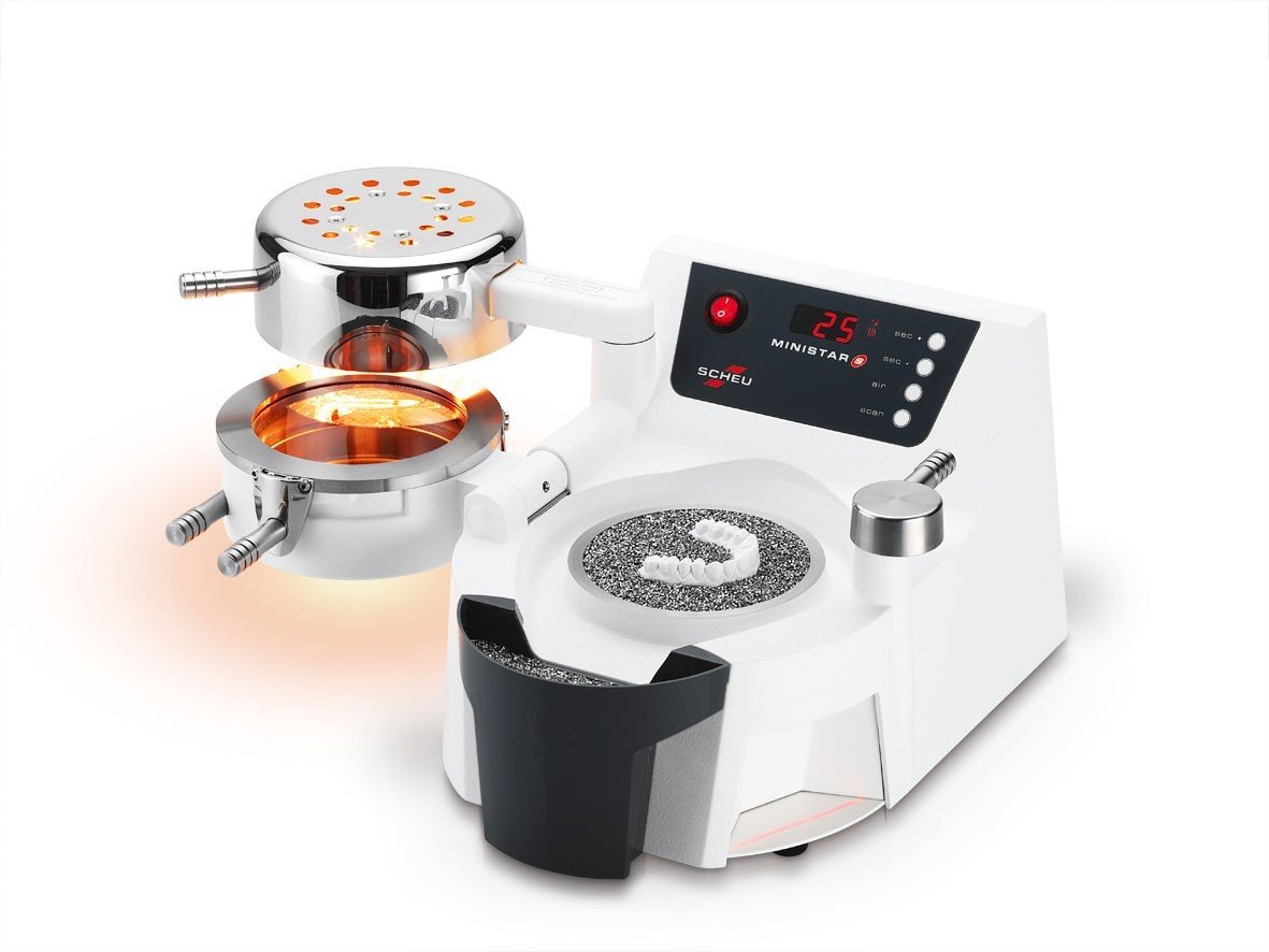 Scheu Ministar S pressure molding machine with barcode scanner for dental applications, featuring control panel and compact design.