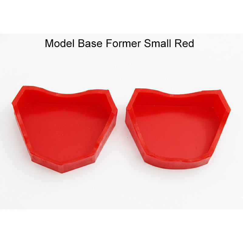 Pair of Shree Rubber Model Bases by Shree Orthodontics, red orthodontic model bases for dental appliance fitting.