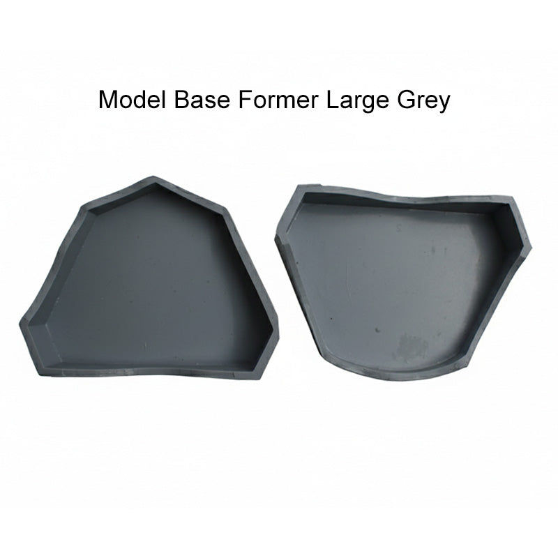 Pair of red Shree Rubber Model Bases from Shree Orthodontics, used as model bases for orthodontic applications.
