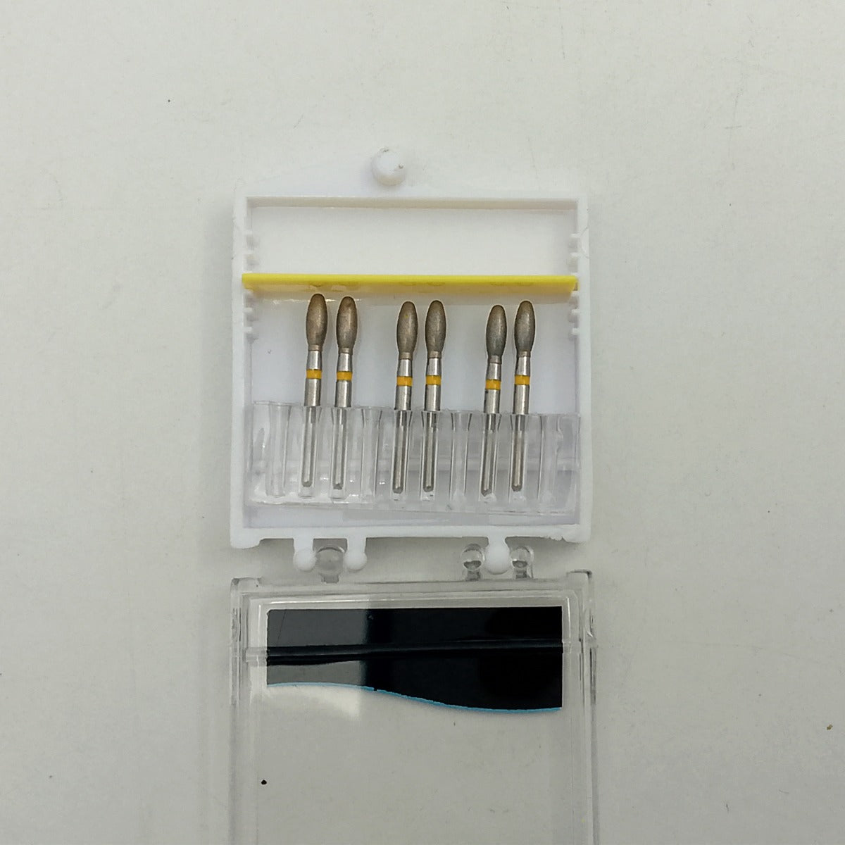 Strauss & Co FG Diamond Burs Egg/Football 023 S.Fine H5.1, set of 6 IPR burs with diamond-coated tips for precision dental work.