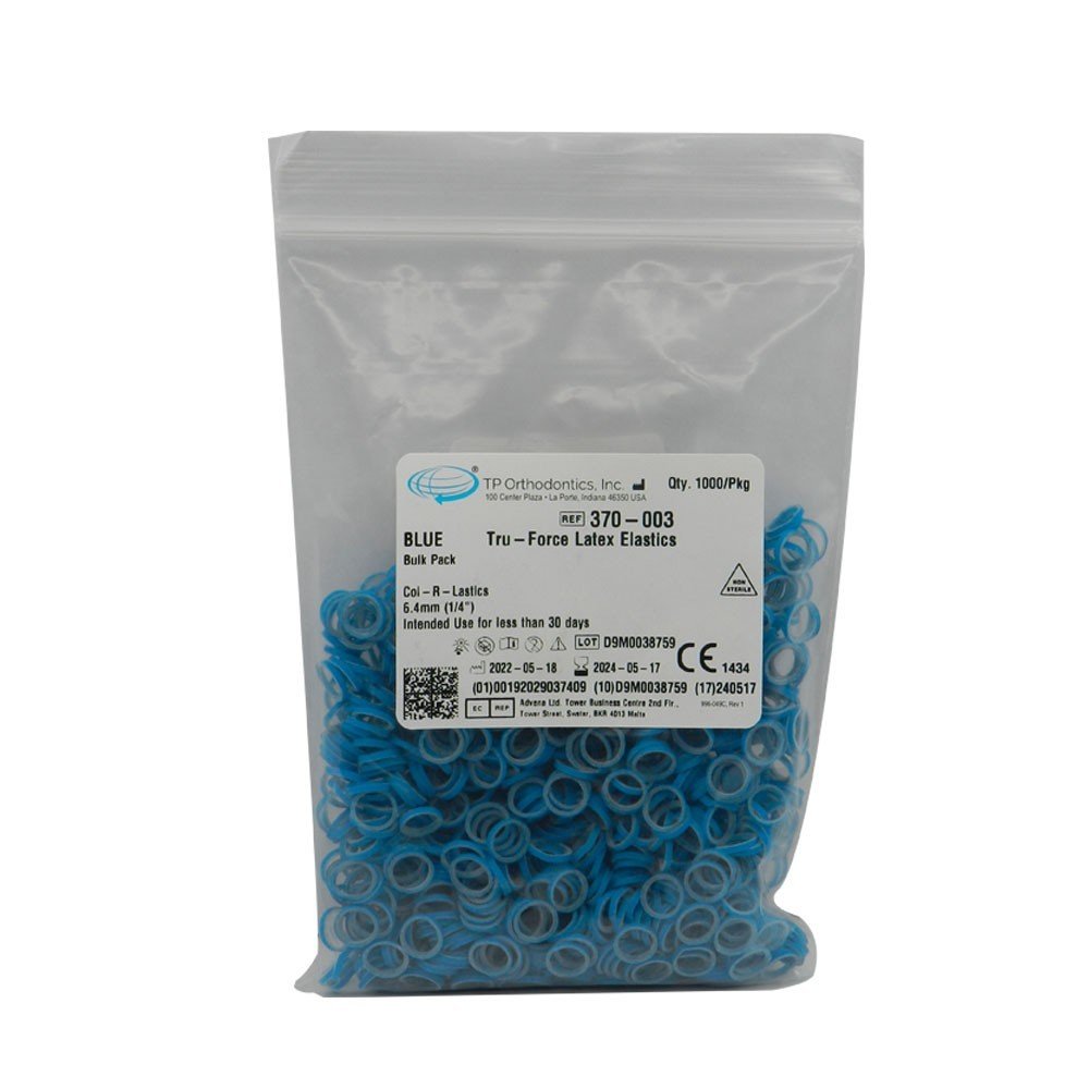 Red TP Orthodontics Col-R-Lastics elastics, orthodontic rubber bands, shown in 3/16 inch size for dental braces.